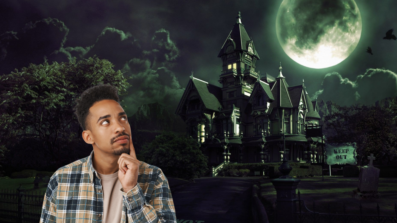 Person in front of haunted house and moon in dark background