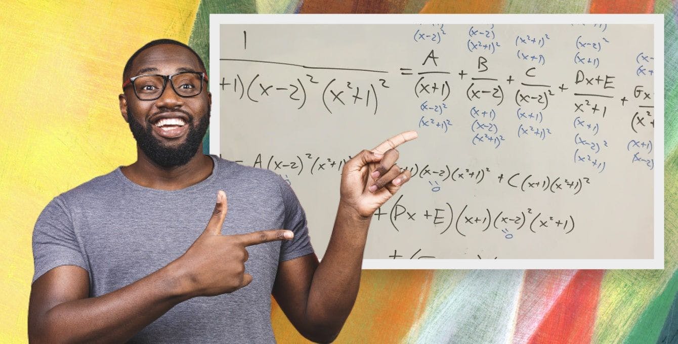 Person standing in front of a white board with math on it. 