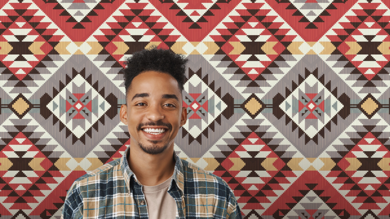 Person against patterned blanket background